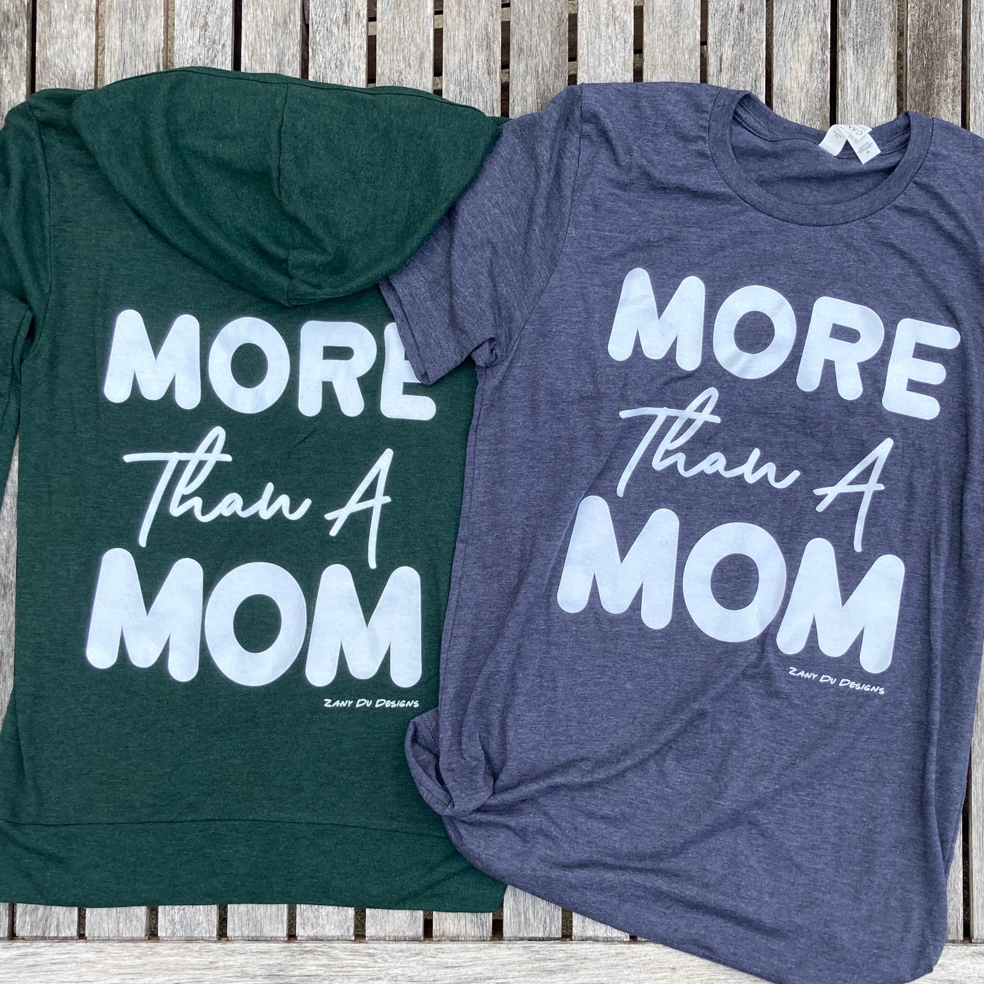 Emerald sparkle lightweight zip up hoodie with the writing saying, "MORE THAN A MOM" on the back of the hoodie.