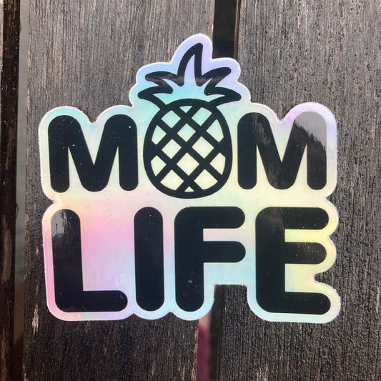 Holographic sticker with the writing saying, "MOM LIFE" and the O in the MOM is a pineapple