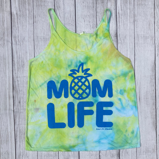 Blue and green tie dye tank top with writing saying, "MOM LIFE" and the O in the MOM is a pineapple. - Tank top - Blue - Green - Pineapple - Tie Dye
