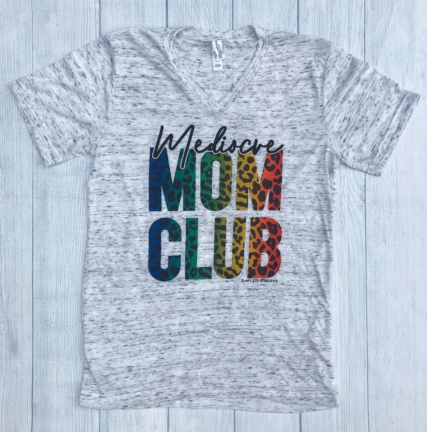 Marbled grey tee that says, "Mediocre MOM CLUB" and the MOM CLUB section is a rainbow and cheetah print - animal print - okay mom - hot mess mom - pride - LGBTQ+ - mother's day - gift