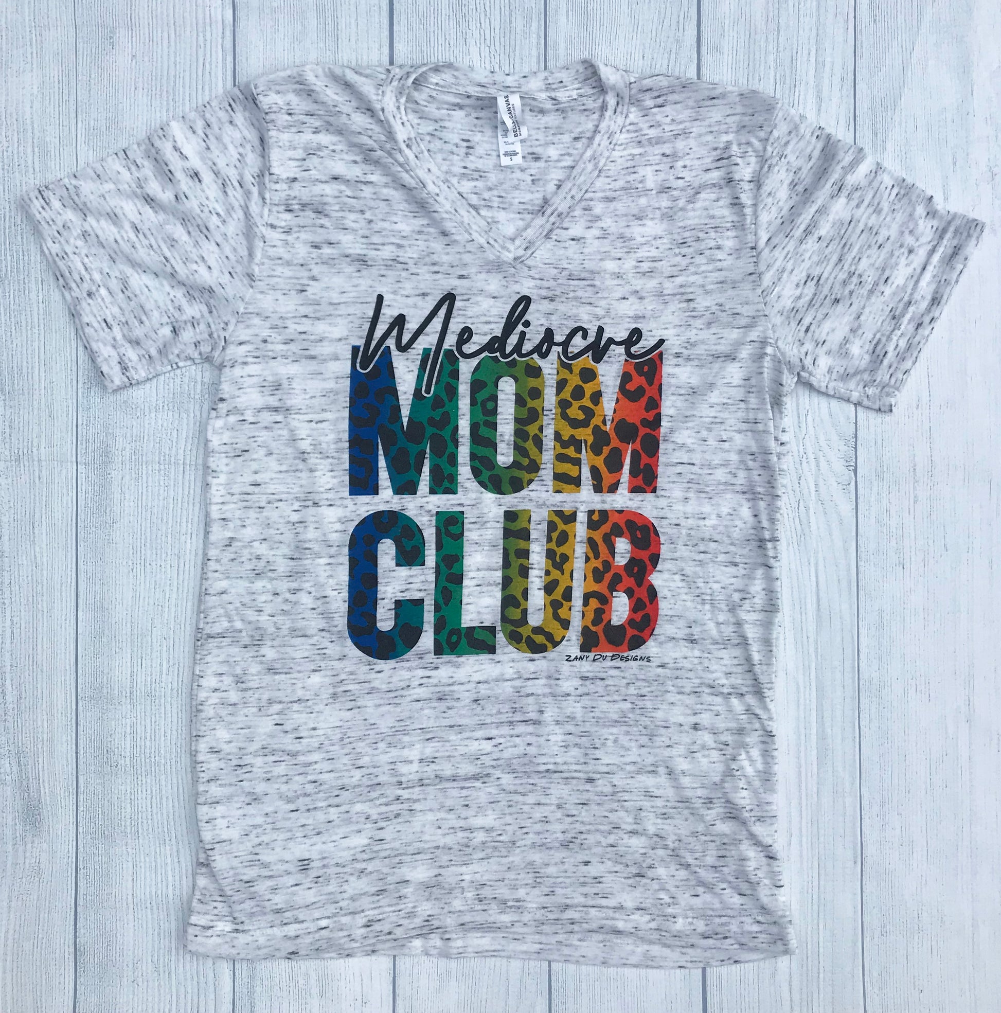 Marbled grey tee that says, "Mediocre MOM CLUB" and the MOM CLUB section is a rainbow and cheetah print - animal print - okay mom - hot mess mom - pride - LGBTQ+ - mother's day - gift