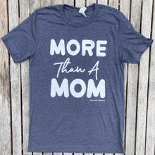 Heather navy sparkle ink tee that has the writing saying, "MORE THAN A MOM" on the front of the tee shirt