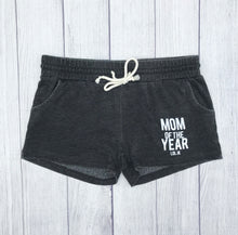 Grey acid washed shorts with pockets that says, "MOM OF THE YEAR JK" with the MOM and YEAR parts being bigger than the other words. - okay mom - motherhood - mediocre mom - shorts - pockets - mom life