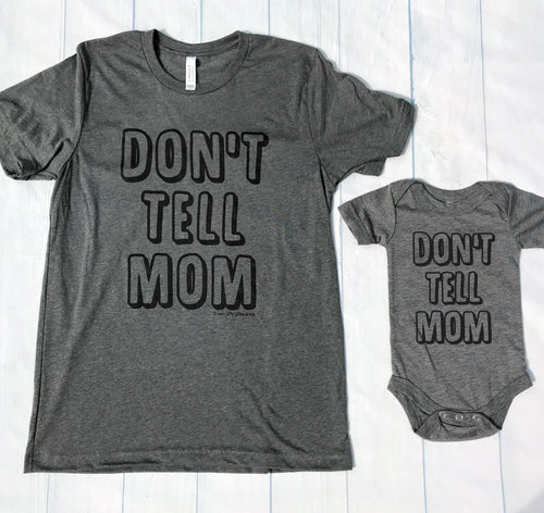 Grey don't tell mom toddler t-shirt with the writing saying, 