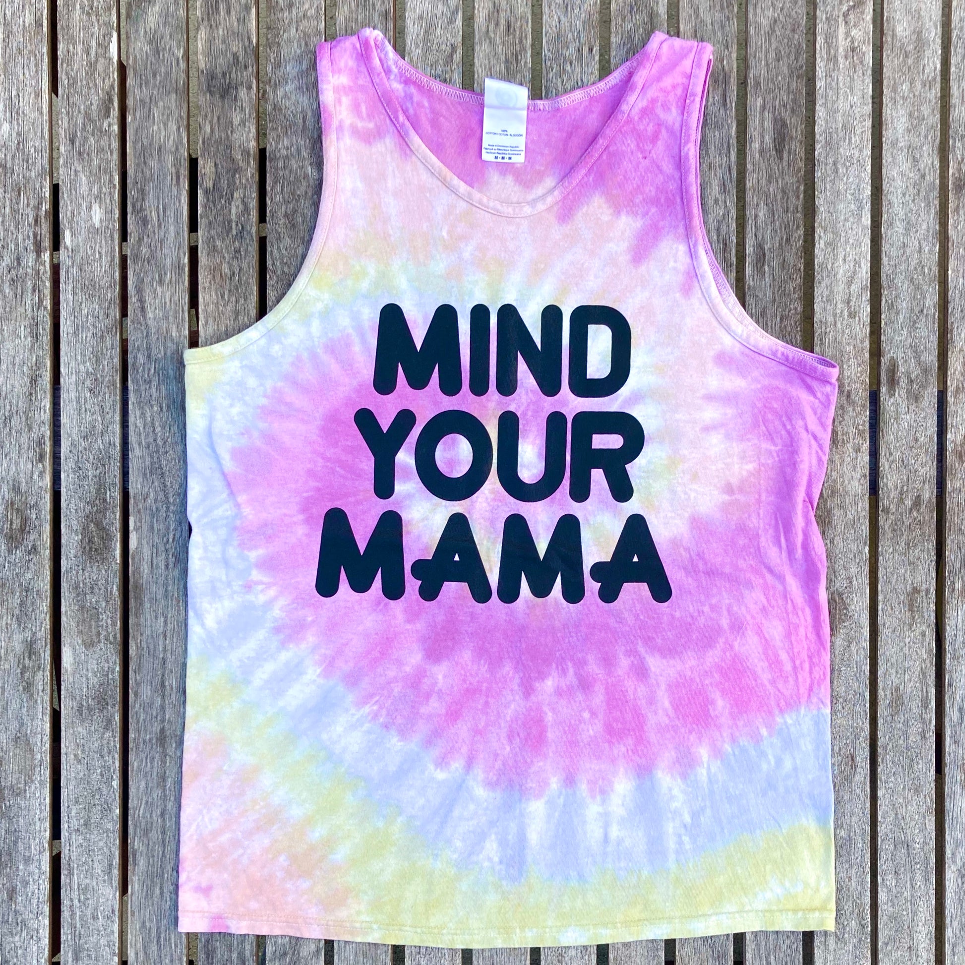 Mind your mama tie dye tank top with rainbow colors and the writing says, "MIND YOUR MAMA" in Navy colored font - Mom -