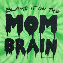Slime green tie dye tee shirt with the writing saying, "BLAME IT ON THE MOM BRAIN", and the MOM BRAIN part has a slime font - Slime - Halloween - Spooky.