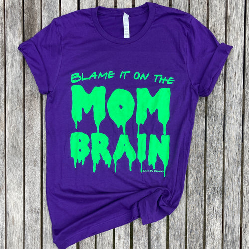 Slime purple and neon green tee with the writing saying, 