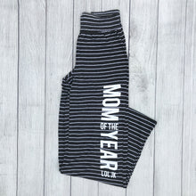 Black and white striped lounge wide legged pants that say, "MOM OF THE YEAR LOL JK" down the leg with the MOM and YEAR being bigger than the other words - Mom - mediocre mom - motherhood - okay mom - mother's day gift