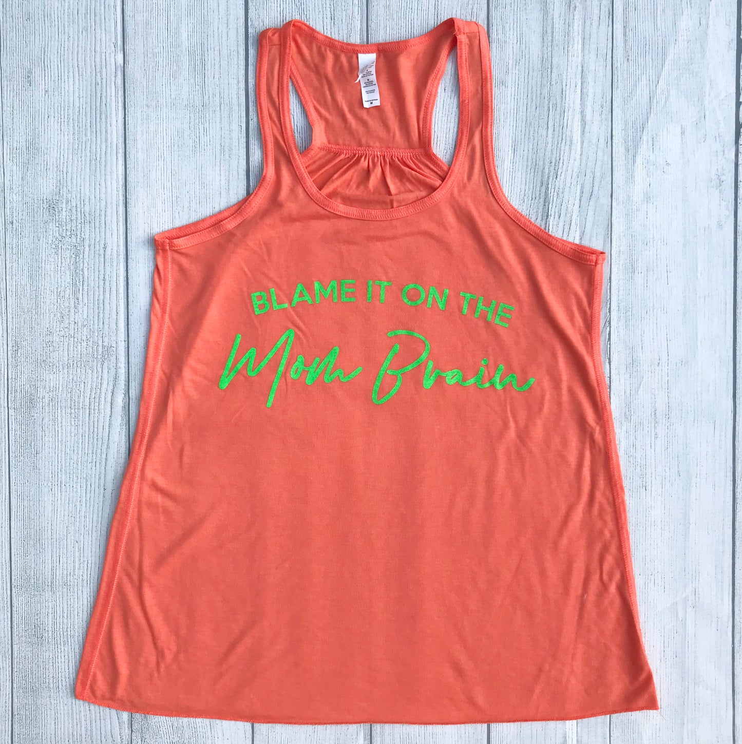 Neon coral tank top that says, "BLAME IT ON THE Mom Brain" and the Mom Brain section is neon green and cursive writing. - Tank top - Neon - Coral - mom life - motherhoof - mother's day gift