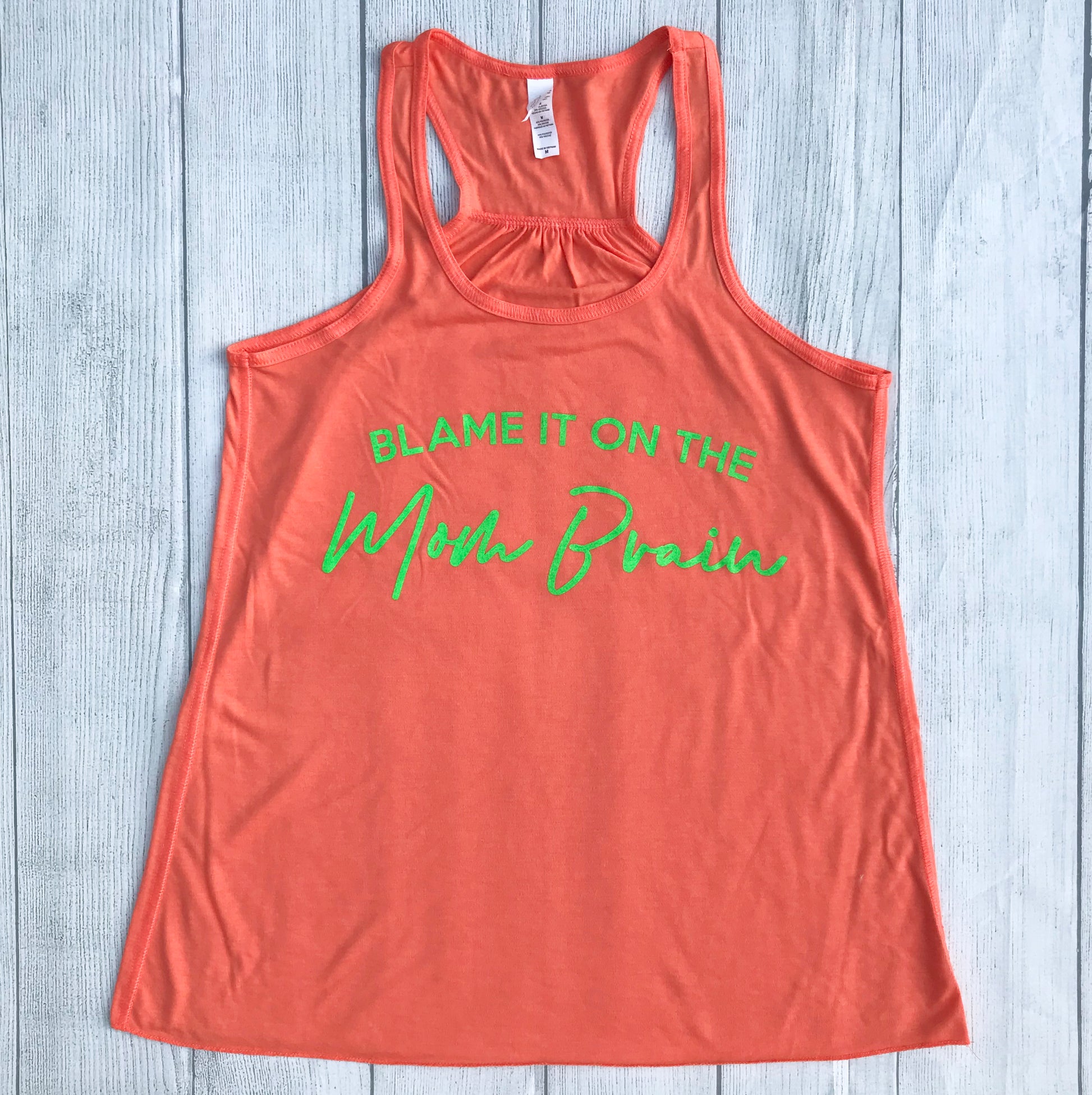 Neon coral tank top that says, "BLAME IT ON THE Mom Brain" and the Mom Brain section is neon green and cursive writing. - Tank top - Neon - Coral - mom life - motherhoof - mother's day gift